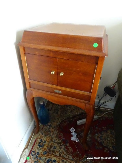 (LR) CROSLEY FLOOR STANDING ENTERTAINMENT CENTER. AM/FM RADIO WITH TAPE PLAYER. 19"X20"X36".