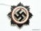 German World War II German Cross in Silver. Has a wide vertical pin back that is maker marked 