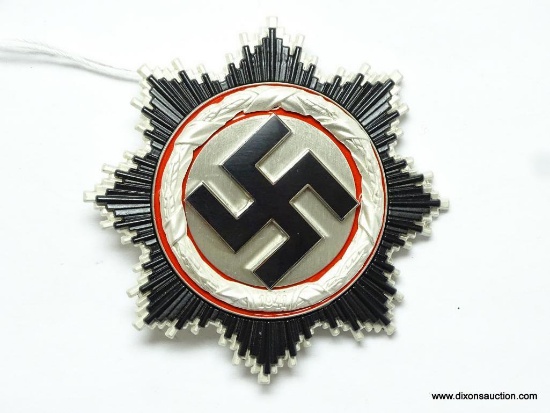 German World War II German Cross in Silver. Has a wide vertical pin back that is maker marked "1",