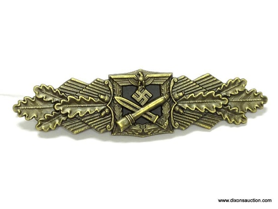 German World War II Army Bronze Close Combat Clasp. The reverse side is maker marked "Fec W E