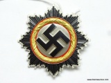 German World War II German Cross in Gold. Has a wide vertical pin back that is maker marked 