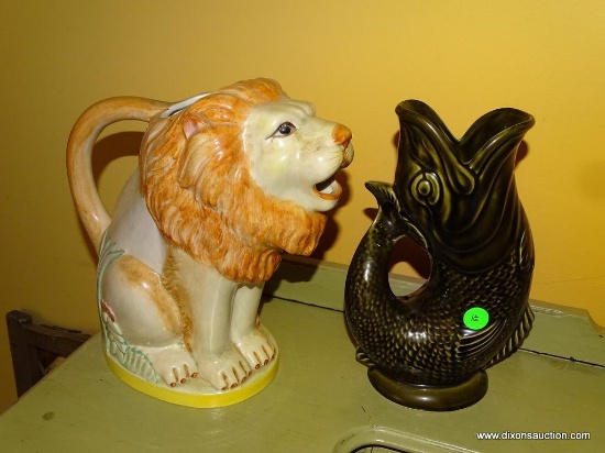 (DR) 2 PITCHERS: INVENTO FISH SHAPED PITCHER: 9.5" TALL. 10.5" TALL LION SHAPED PITCHER.
