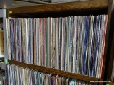 SHELF LOT OF RECORDS. APPROX 200 PLUS OR MINUS. SHELF 1 RACK 2. INCLUDES COMEDY ALBUMS, RODNEY