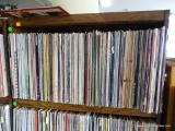 SHELF LOT OF RECORDS. 200 PLUS OR MINUS. SHELF 1 RACK 3. INCLUDES CHRISTMAS MUSIC, PATRIOTIC MUSIC,