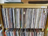 SHELF LOT OF RECORDS. 200 PLUS OR MINUS. SHELF 1 RACK 6. INCLUDES FLIP WILSON 