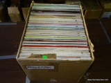 BOX FULL OF RECORDS UNDER TABLE 1. APPROX. 100. PLUS OR MINUS. INCLUDES FRANKIE LAINE, FRANKIE LAINE