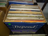 BOX FULL OF RECORDS UNDER TABLE 2. APPROX. 50 PLUS OR MINUS. INCLUDES THELONIOUS MONK, BETTE MIDLER,