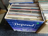 BOX FULL OF RECORDS UNDER TABLE 2. APPROX. 50 PLUS OR MINUS. INCLUDES TOMMY ROE, EILEEN RODGERS,