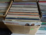 BOX FULL OF RECORDS UNDER TABLE 3. APPROX. 100 PLUS OR MINUS. INCLUDES THE WIZARD OF OZ, SLEEPING