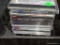 (METAL SHELVES) LOT OF 10 CDS: EAGLES. BARBRA STREISAND. KENNY CHESNEY. ENGLEBERT HUMPERDINCK. ETC.