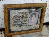 (WALL) MIRRORED BACK COCA COLA ADVERTISING SIGN. IN WOODEN FRAME: 23.5