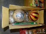 (TABLES) BOX FILLED WITH LARGE CHRISTMAS BALL ORNAMENTS