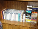 (WOOD SHELVES) LOT OF VHS TAPES: HAPPY GILMORE. E.T. TITANIC. BORN ON THE FOURTH OF JULY. FOR PETE'S