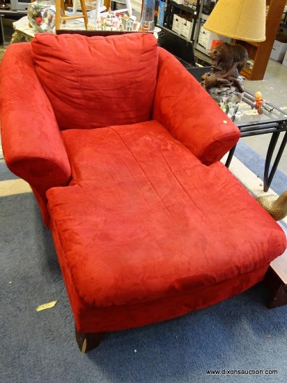 (ROW 1) RED SUEDE CHAISE LOUNGE. IS IN VERY GOOD USED CONDITION: 40"x60"x32". DELIVERY IS AVAILABLE