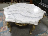 (ROW 2) LARGE GOLD GILT BASE AND MARBLE TOP COFFEE TABLE. BASE HAS FRENCH QUEEN ANNE FEET WITH
