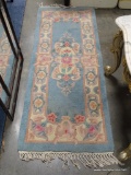(ROW 2) ORIENTAL STYLE FLORAL RUNNER IN BLUE AND ROSE: 72.5