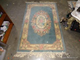 (ROW 2) ORIENTAL STYLE FLORAL RUG IN BLUE AND ROSE: 74