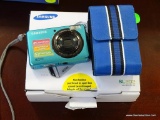 (ROW 3) SAMSUNG SL202 DIGITAL CAMERA IN BLUE. IS IN ORIGINAL BOX WITH CHARGER.