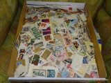 (ROW 3) TRAY LOT OF VARIOUS STAMPS FROM AROUND THE WORLD.
