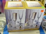 (TABLES) 2 BOXES OF COLONY CHAMPAGNE FLUTES. ONLY 1 FLUTE IS MISSING (7 TOTAL)