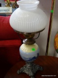 (ROW 1) PEWTER AND CERAMIC OIL LAMP CONVERTED TO ELECTRIC. HAS MILK GLASS SHADE. HAS PAW FEET AND