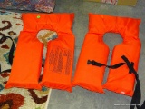 (TABLES) PAIR OF LIFE PRESERVERS