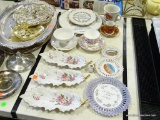 (TABLES) PORCELAIN LOT: WESTERN GERMANY CUP AND SAUCER. STAFFORDSHIRE BONE CHINA CUP AND SAUCER. 3