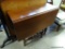 (R1) ANTIQUE GATE LEG MAHOGANY TABLE. HAS BEEN PROFESSIONALLY STRIPPED AND REFINISHED. WITH LEAVES