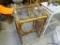 (R6) VINTAGE RATTAN AND GLASS TABLE MEASURES 23.5 IN BY 18.5 IN BY 30 IN