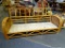 (R6) LARGE VINTAGE RATTAN SOFA. THIS PIECE WILL TAKE 3 CUSHIONS ACROSS AND HERE IT IS JUST IN TIME