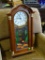(R3) DEA QUARTZ CLOCK WITH WESTMINSTER CHIME IN OAK CASE WITH FLORAL STAINED GLASS FRONT: 11