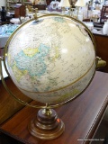 (R1) GLOBE OF THE WORLD ON REVOLVING STAND. THIS GLOBE CAN BE TURNED SIDE TO SIDE AND UP AND DOWN TO