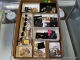 NICE BLOCK OF ESTATE COSTUME JEWELRY WITH EARRINGS, NECKLACES, CHARMS, BROOCHES AND MORE.