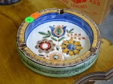 (R2) VERY COLORFUL ARTIST SIGNED ASH TRAY. 7.25'' DIA. IS IN VERY GOOD CONDITION.
