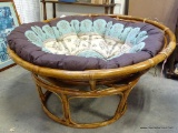 (R6) ROUND RATTAN PAPASAN CHAIR WITH BROWN, BLUE AND IVORY CUSHION. MEASURES 46