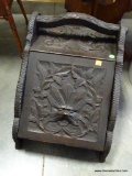 (R1) PAINTED BLACK WOODEN CARVED COAL HOD WITH FLORAL AND ANIMAL FACE CARVINGS. HAS PAN: 14