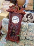 (R3) DEA ORNATELY CARVED CHERRY CASED WALL CLOCK WITH PENDULUM AND KEY: 13