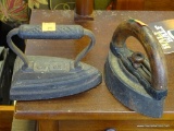 (R3) 2 CAST IRON SAD IRONS (1 WITH WOODEN HANDLE)