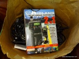 (R4) BAG LOT OF MISC. WIRES. INCLUDES A MIDLAND MICRO PORTABLE CB RADIO WITH ORIGINAL BOX.