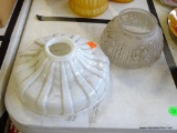 (TABLE) 2 VINTAGE GLASS LAMP SHADES: 1 MILK GLASS AND 1 WITH ROSE PATTERN.