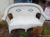 (O) VERY NICE ANTIQUE WHITE WICKER WITH BLUE TRIM SETTEE.