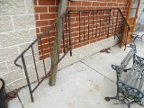 IRON RAILING FOR A DOUBLE SIDED SET OF BRICK STEPS LEADING INTO A HOUSE. THE POSSIBILITIES ARE