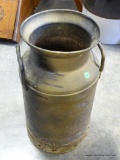 (R1) ANTIQUE MILK CAN WITH ORIGINAL DRAINAGE HOLE. CAN BE USED AS A FRONT PORCH PLANTER, UMBRELLA