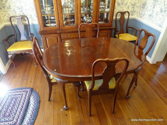 (DR) MAHOGANY QUEEN ANNE DINING ROOM TABLE WITH 2 LEAVES AND 6 CHAIRS. LEAVES ARE 12" WIDE EACH.