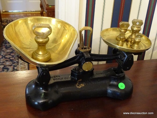 (KIT) VINTAGE LIBRA SCALE CO. CAST IRON SCALE WITH BRASS WEIGHTS AND BRASS TRAYS: 8.5"x12"x8.5"