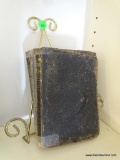 (LR) ANTIQUE BIBLE FROM 1885. IN VERY GOOD USED CONDITION FOR ITS AGE! INCLUDES A BRASS STAND.