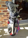 (PORCH) ADAMS GOLF BAG WITH CLUBS: 3 DRIVERS. 3 PUTTERS. 9 WEDGES.