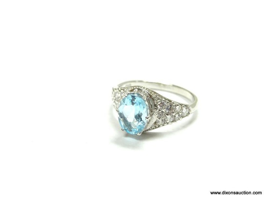.925 STERLING SILVER AAA TOP QUALITY 2 CT FACETED BLUE TOPAZ SURROUNDED BY OVER 20 SAPPHIRES ON