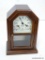 NEW ENGLAND 8 DAY MANTLE CLOCK WITH TIME AND STRIKE. 11.5'' TALL 8'' WIDE. RETAIL PRICE $425