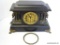 E. INGRAHAM BLACK 8 DAY MANTLE CLOCK WITH GREEN COLUMNS. BELL ON HALF HOUR WITH TIME AND STRIKE.